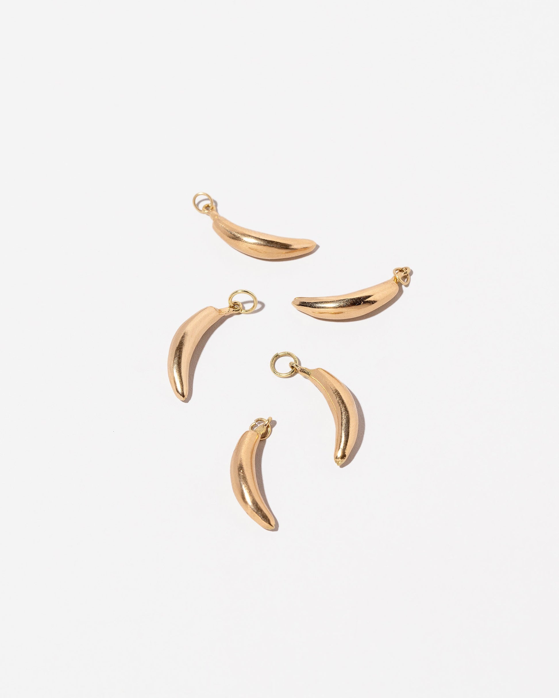 Banana Charms on light color background.