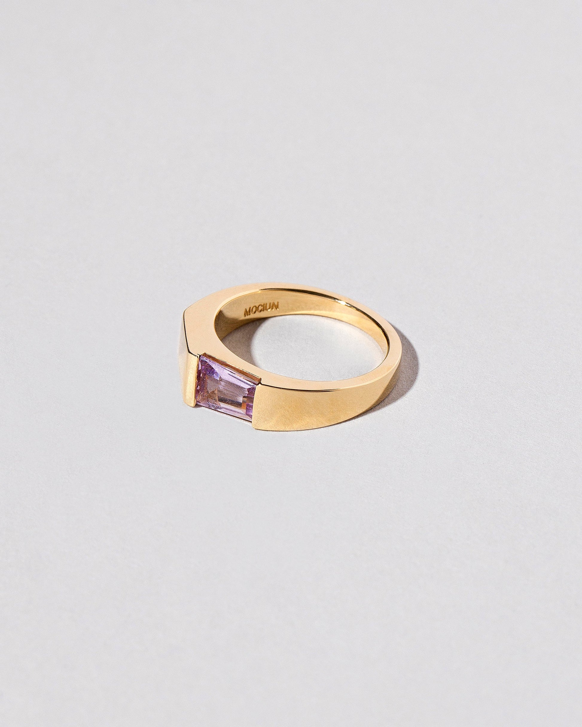 View from the side of the Mirror Ring on light color background.