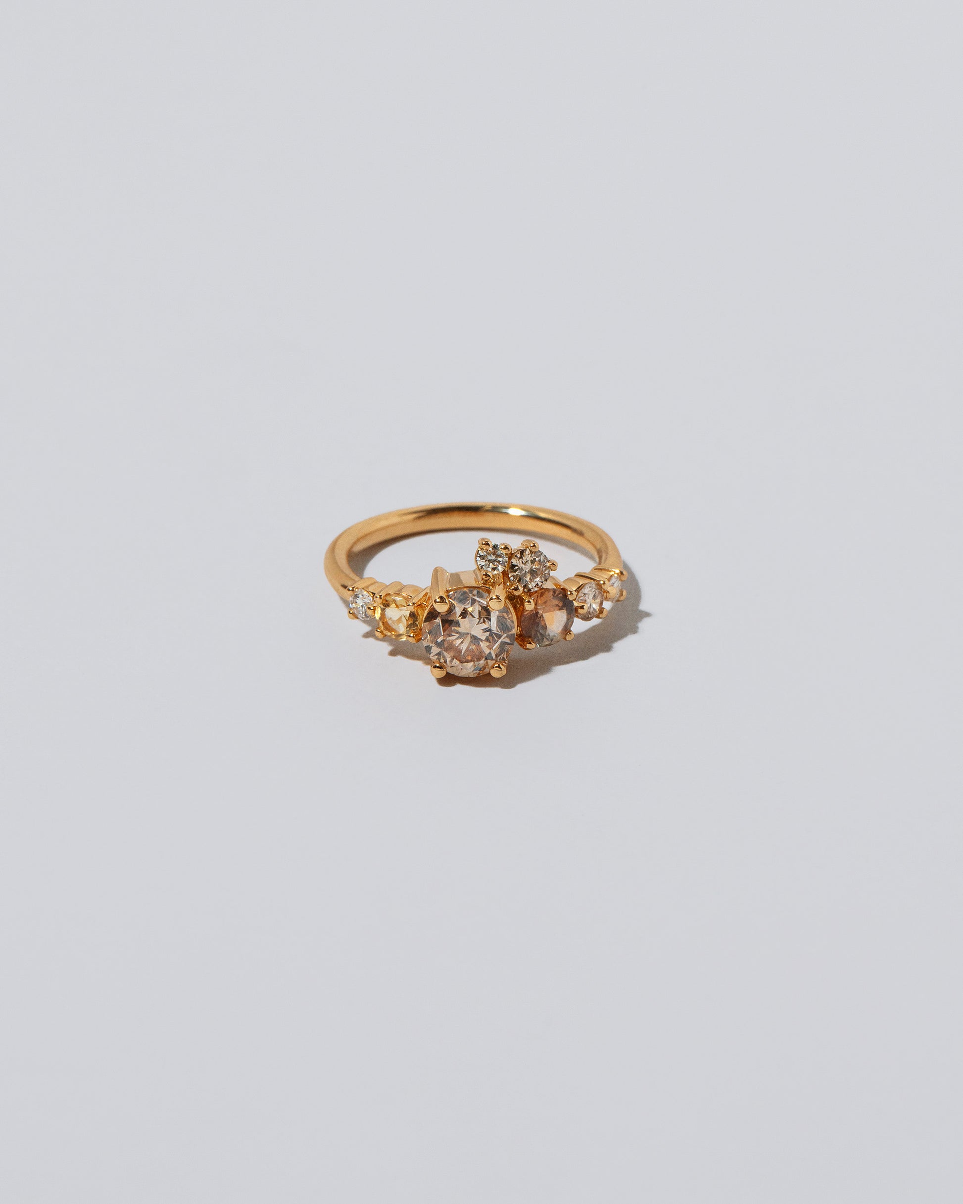 Product photo of Champagne Luna Ring on light color background. 