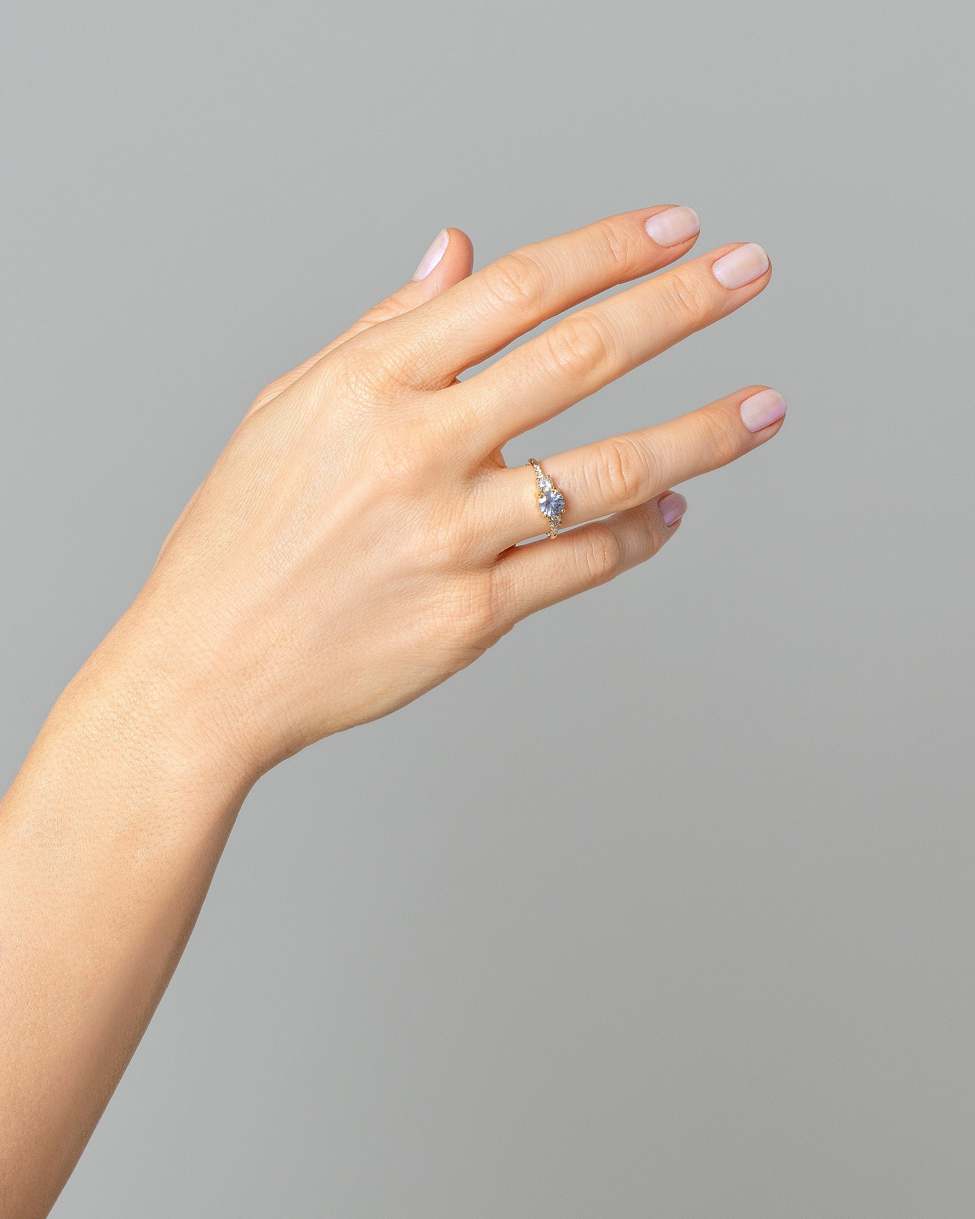 Orion Ring - Purple Sapphire on light color background.