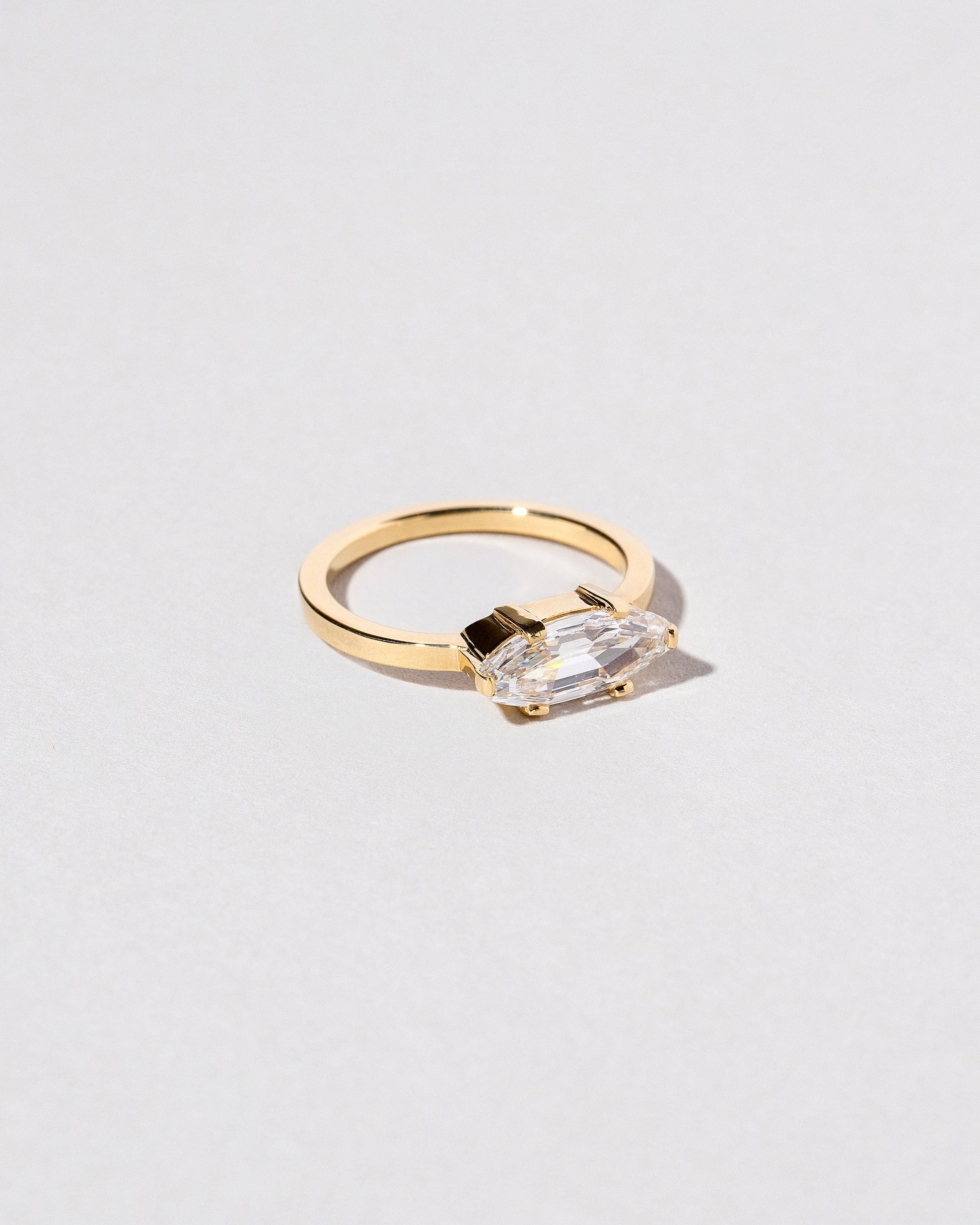 View from the side of the Columba Ring on light color background.
