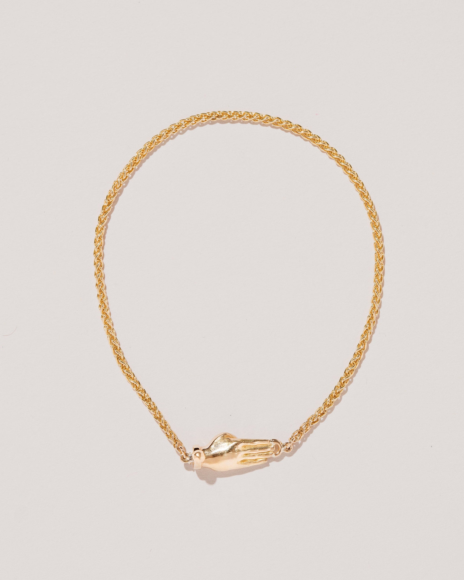  Manifestation Bracelet on light color background.