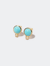  Sky Earrings on light color background.