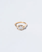  Genesis Ring on light color background.