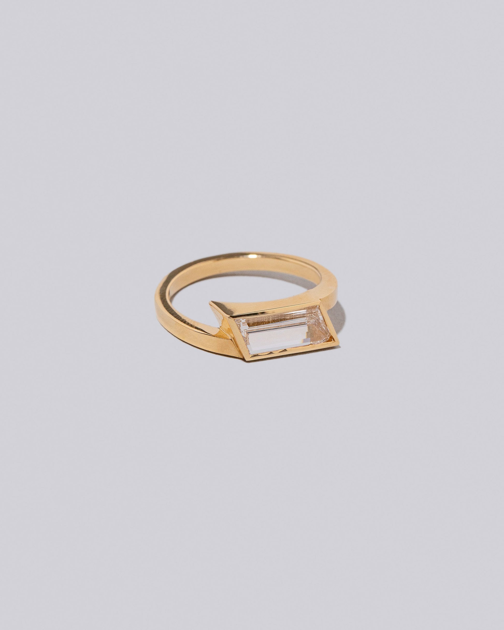 View from the side of the Melody Ring on light color background.