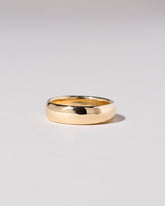 Gold 6mm Half Round Band on light color background.