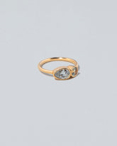  Assal Ring on light color background.