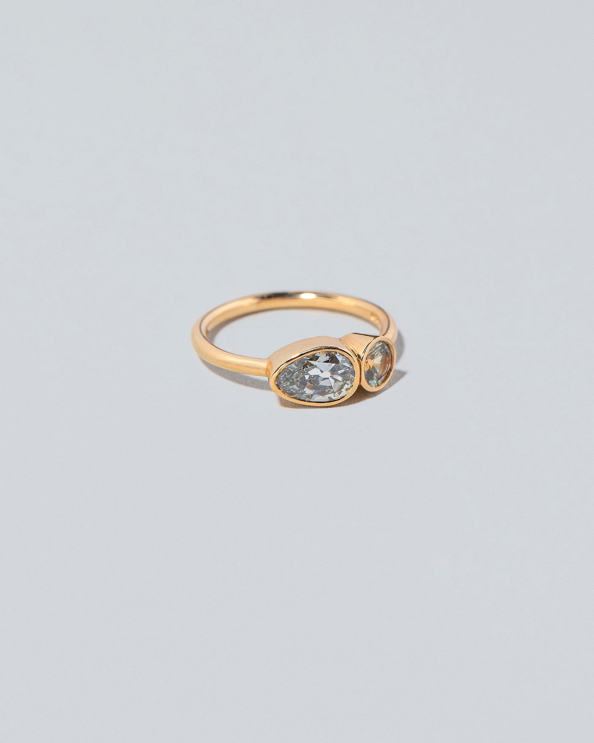  Assal Ring on light color background.