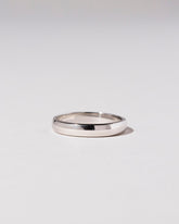 Platinum 3mm Half Round Band on light color background.