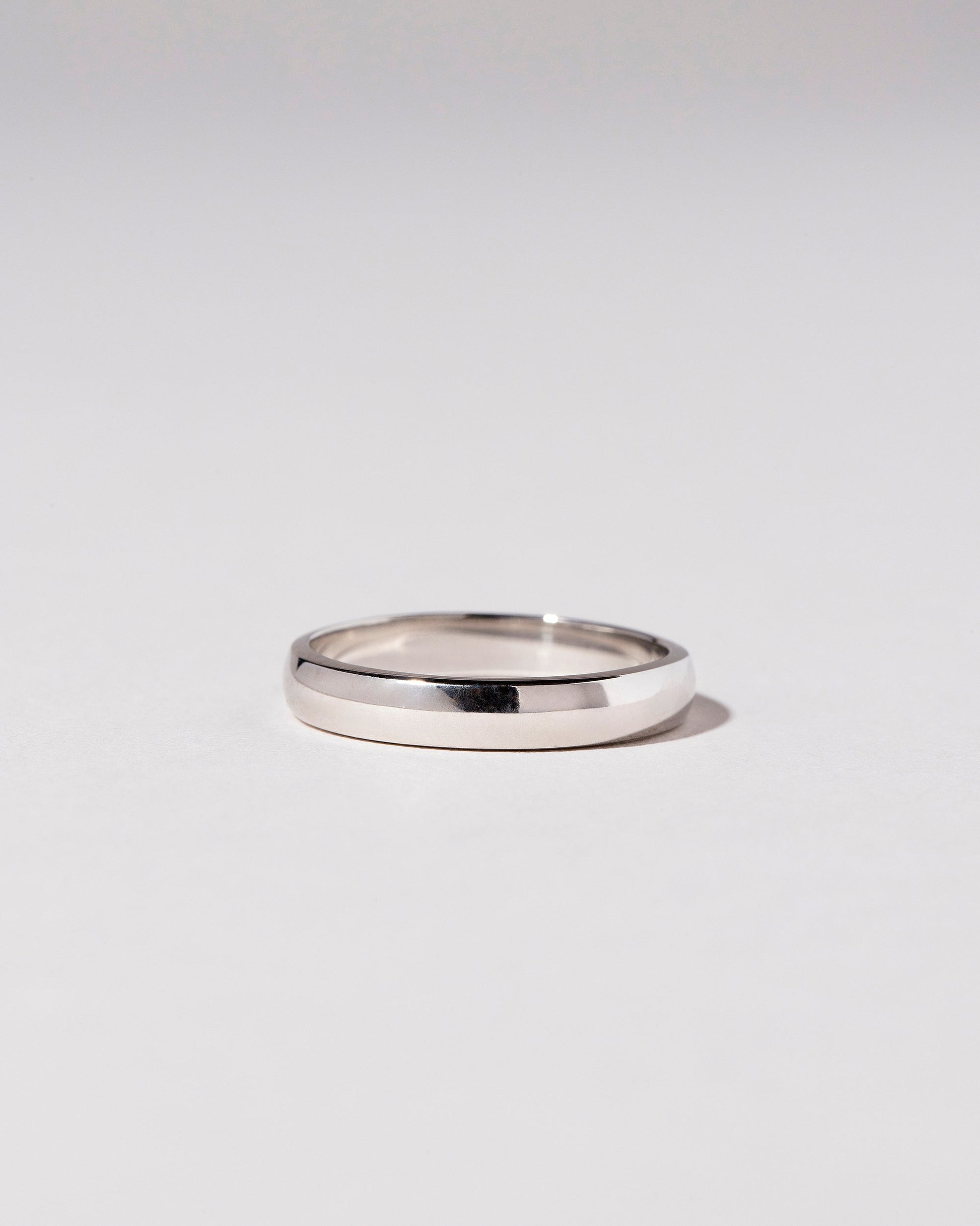 Platinum 3mm Half Round Band on light color background.