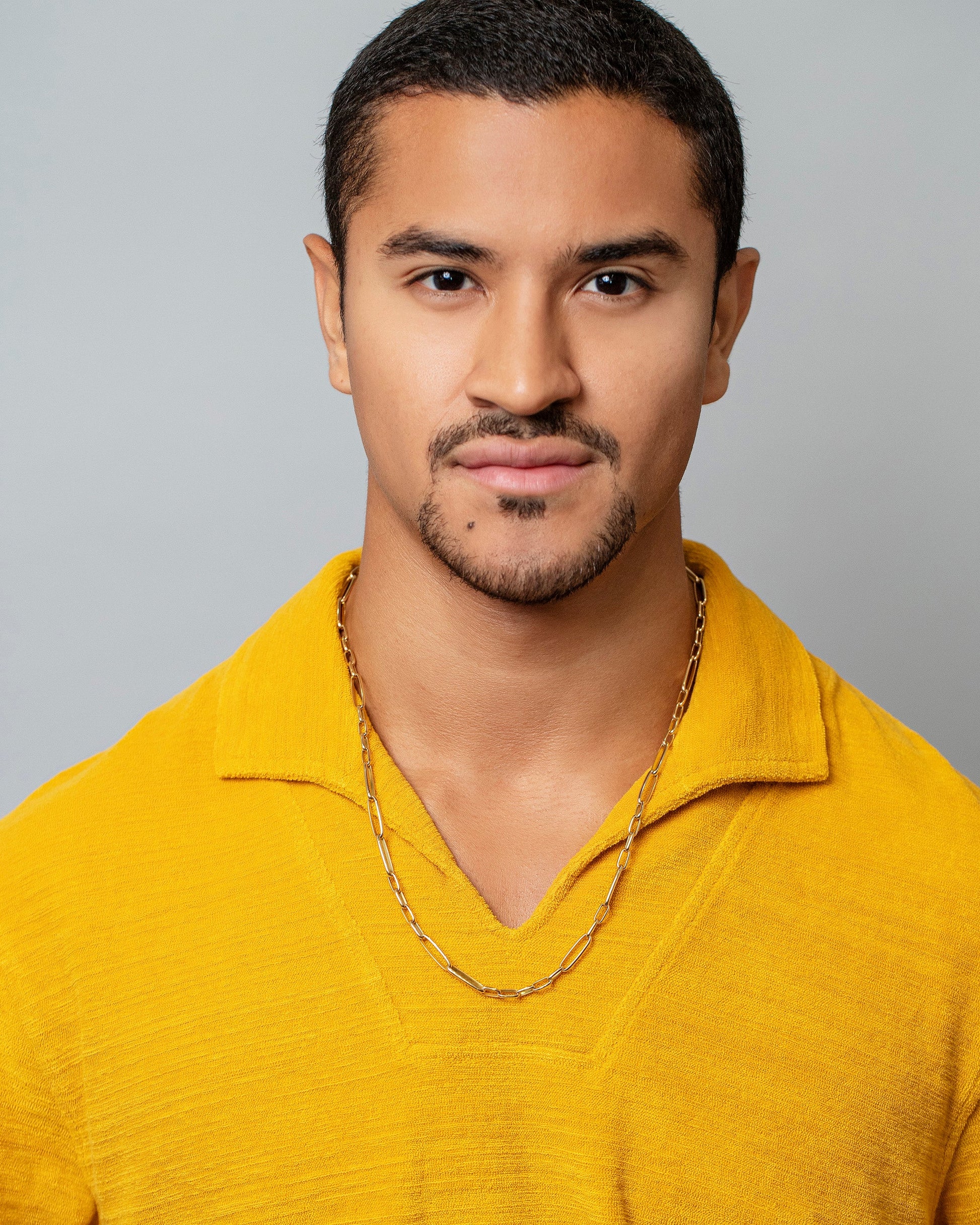 Long Loop Chain Necklace on male model.