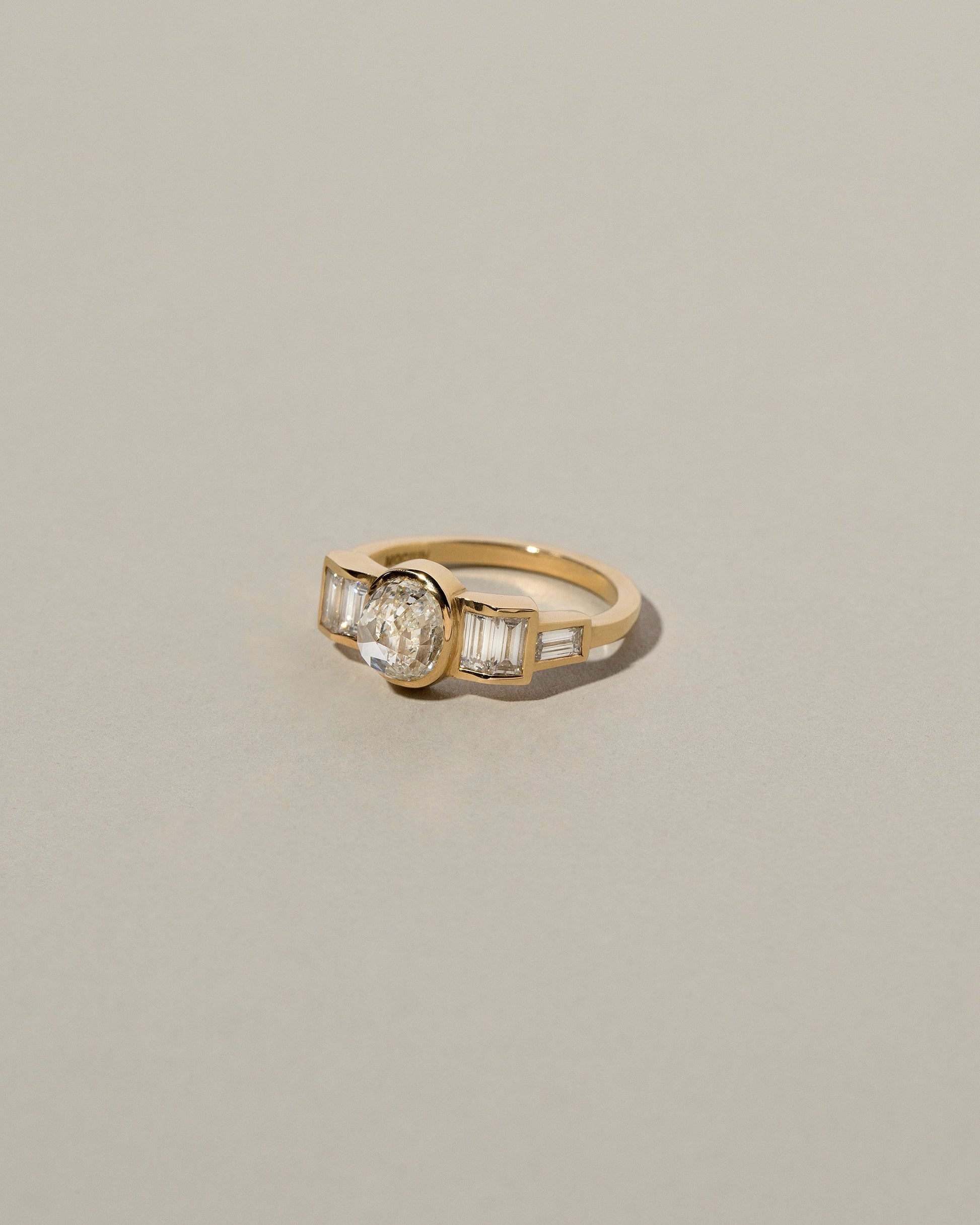  Modified Brilliant Diamond Ring on light color background.