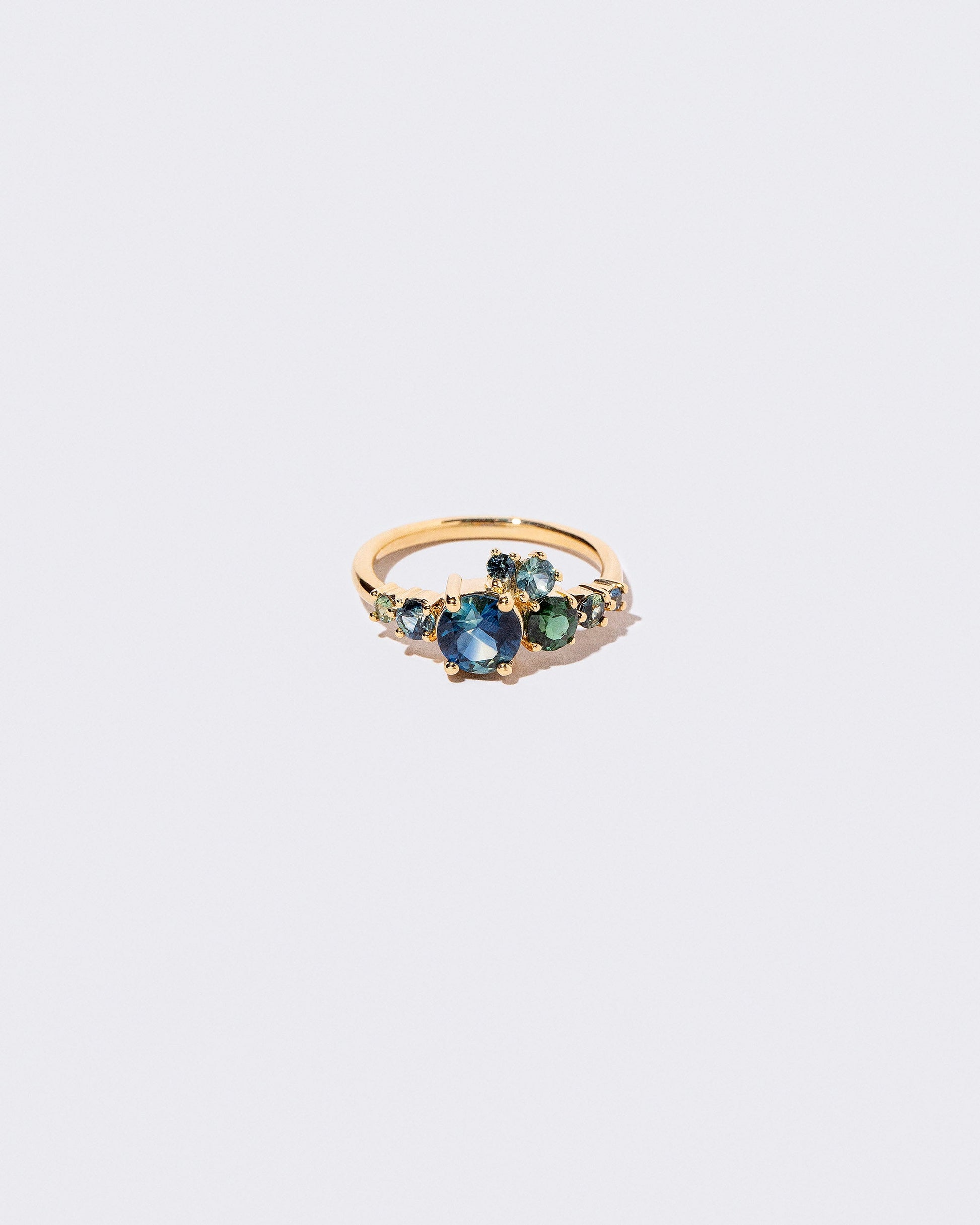 Luna Ring - Bicolor Sapphire on light color background.