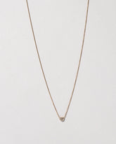  Half Moon Necklace on light color background.