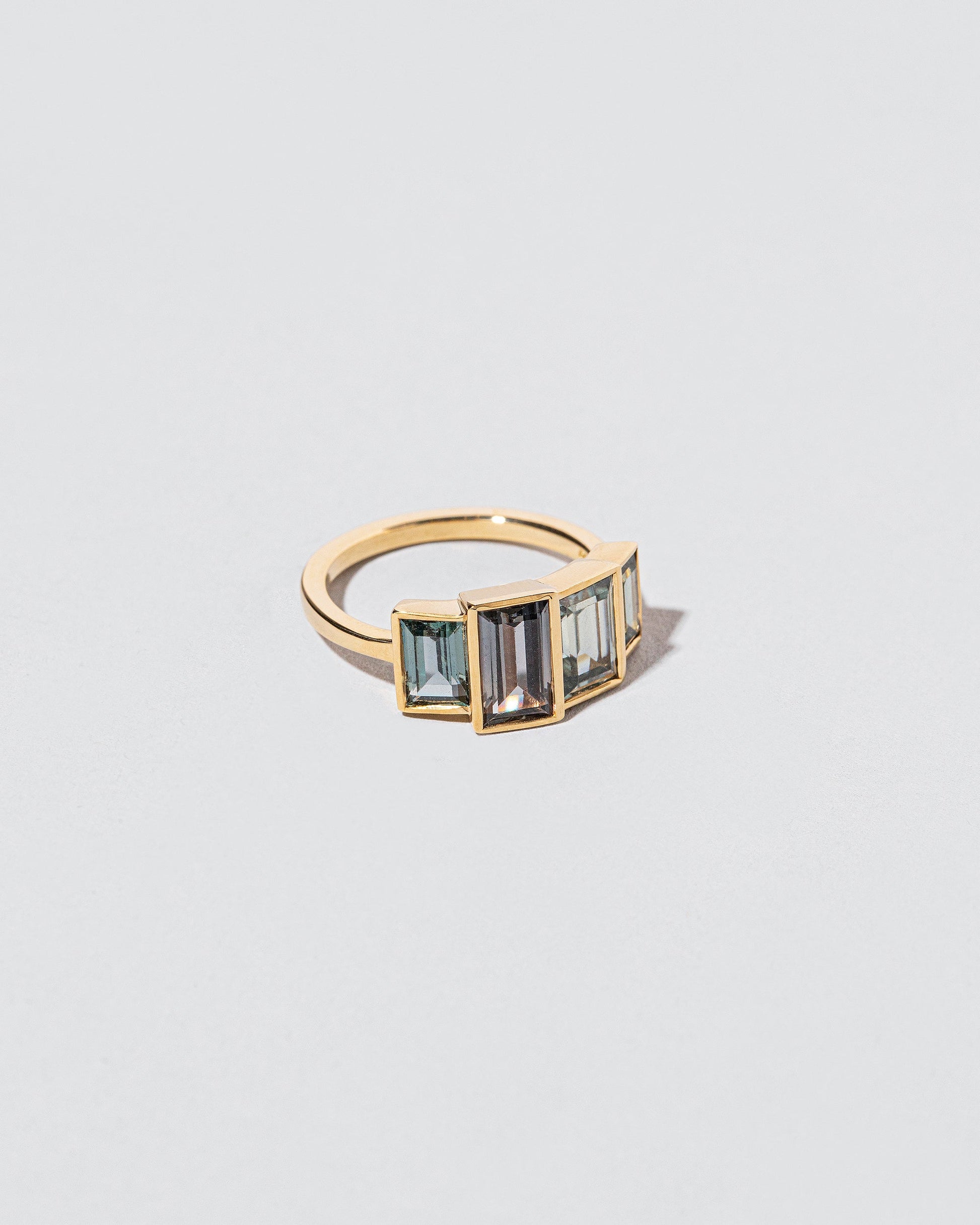 View from the side of the Nile Ring on light color background.