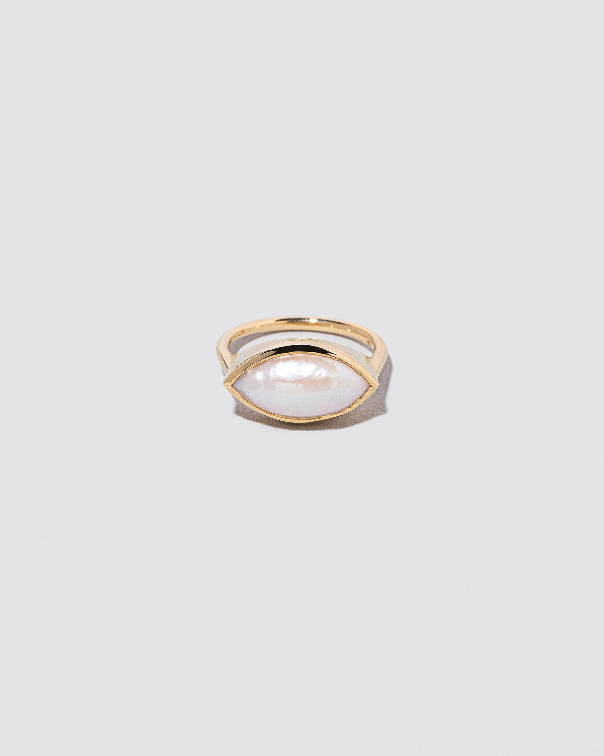 Triton Ring on light color background.