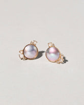  Mabe Pearl Cluster Earrings on light color background.
