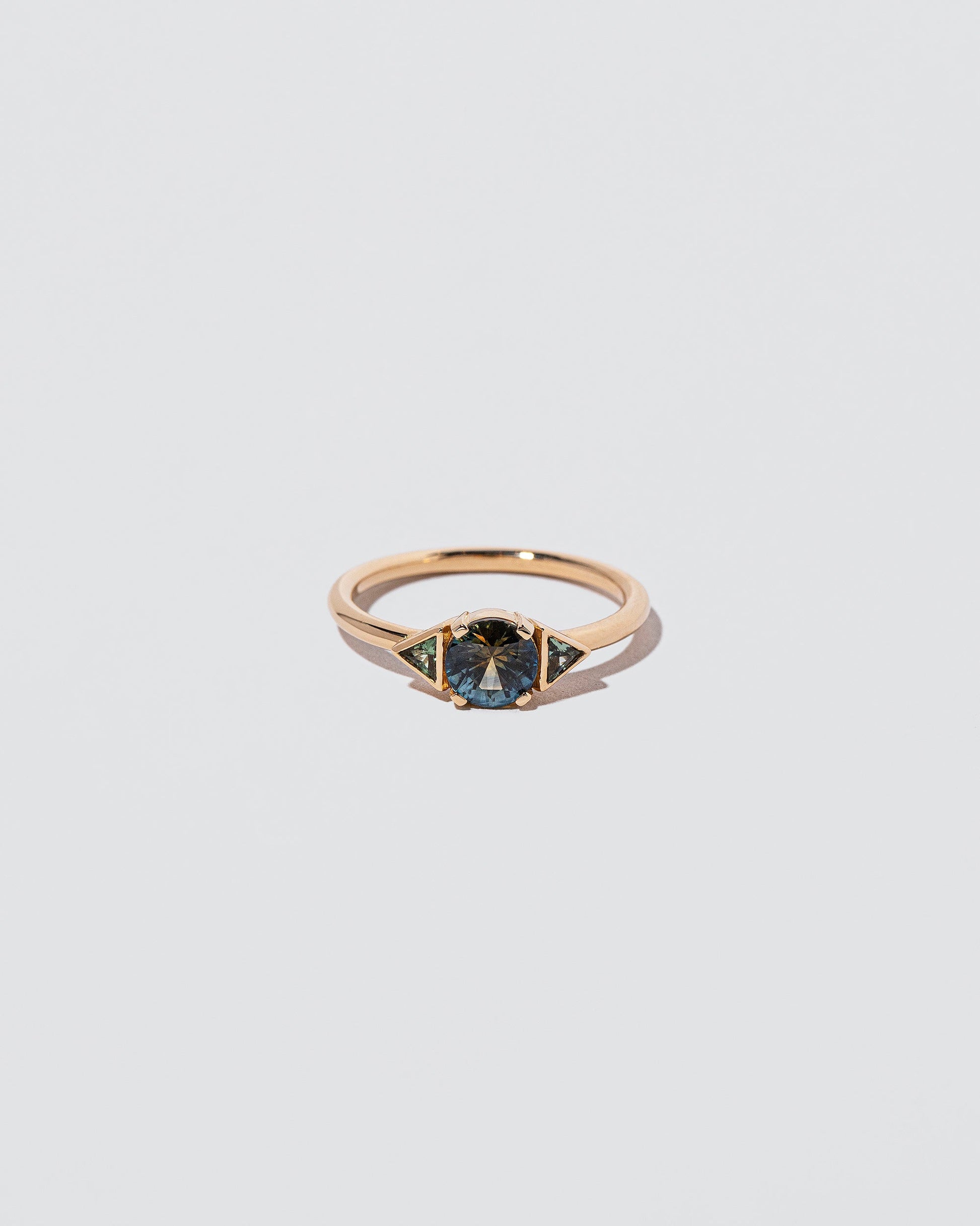  Triadic Ring on light color background.