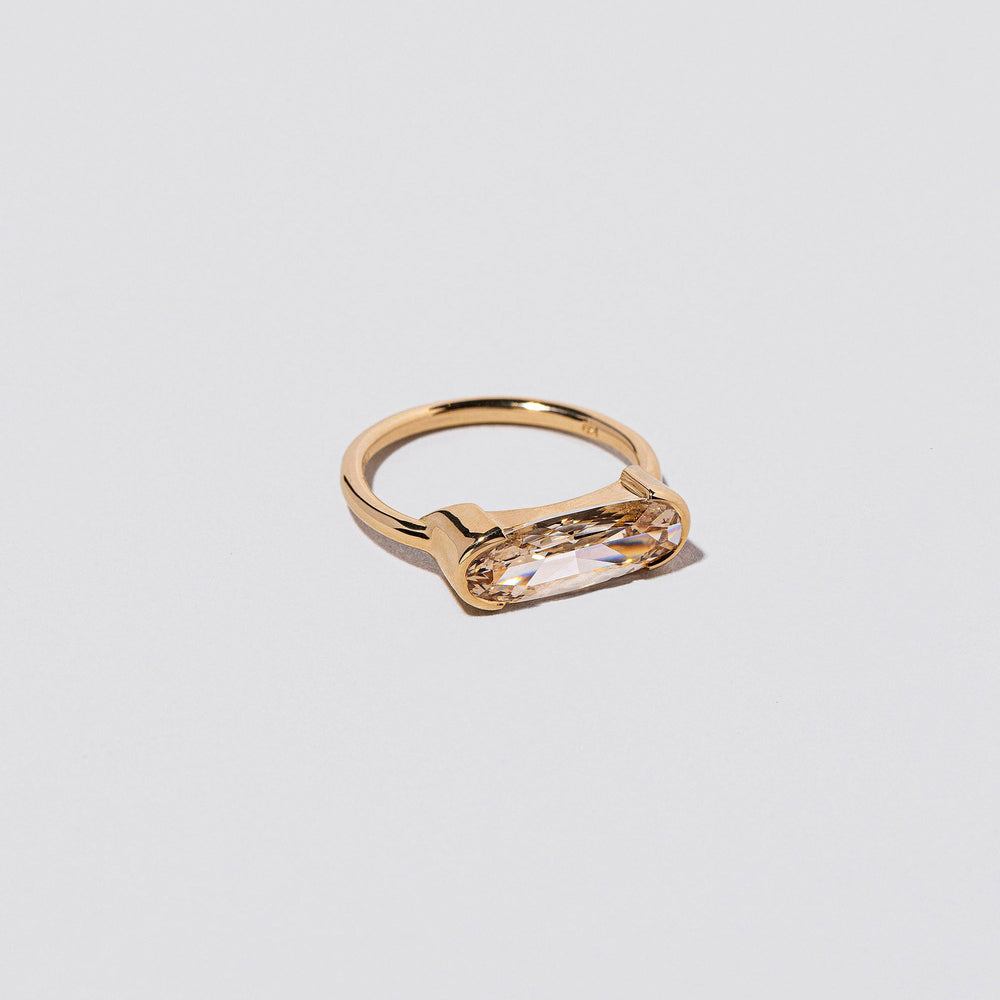 product_details::Closeup details of the Dancing Ring on light color background.