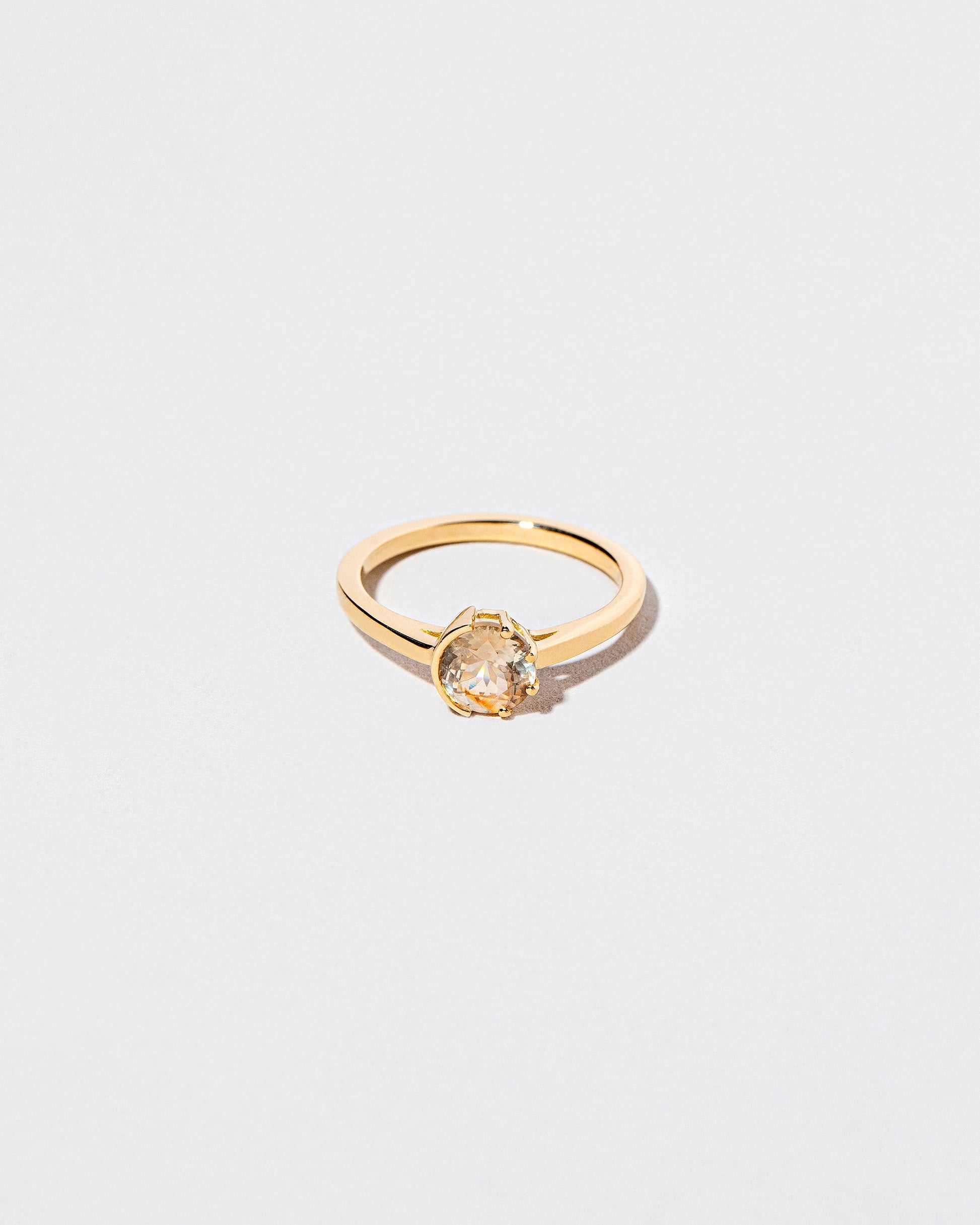  Sun & Moon Ring - Bicolor Yellow Sapphire on light color background.