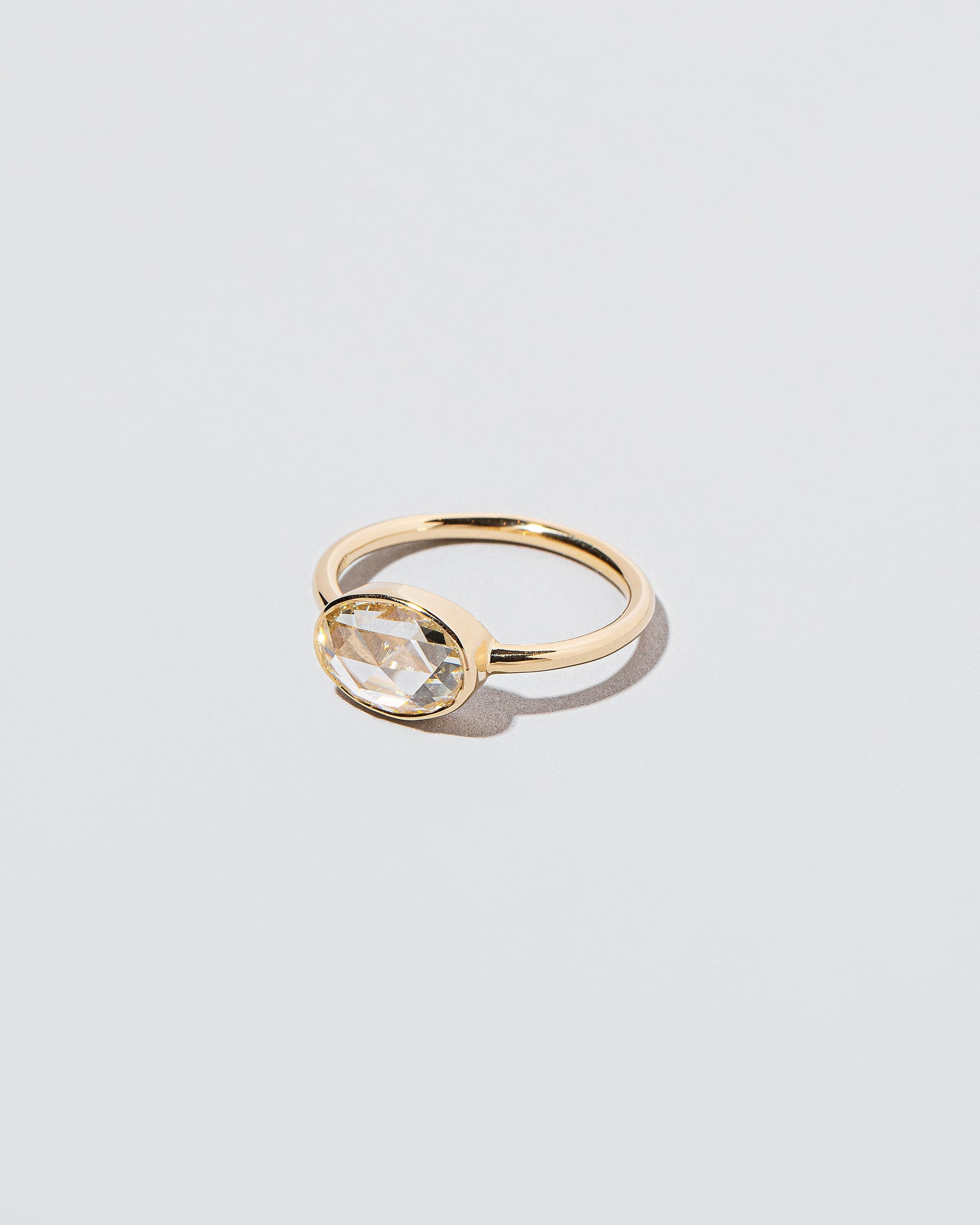 View from the side of the Ellipse Ring on light color background.