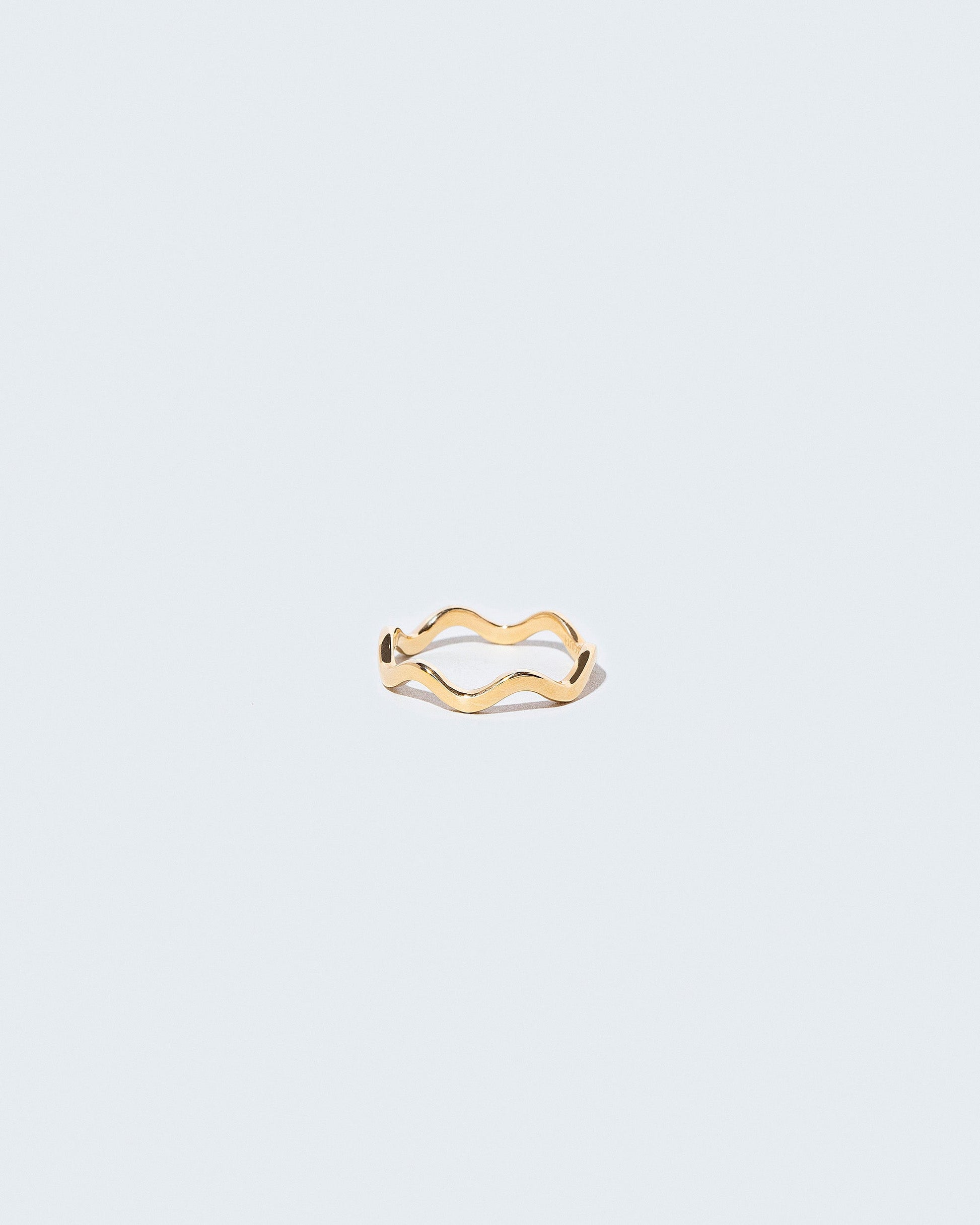 Gold 2mm Ripple Band on light color background.