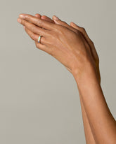 Gold Mega Five Triangle Ring on model.