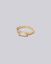 View from the side of the Vibrato Ring on light color background.
