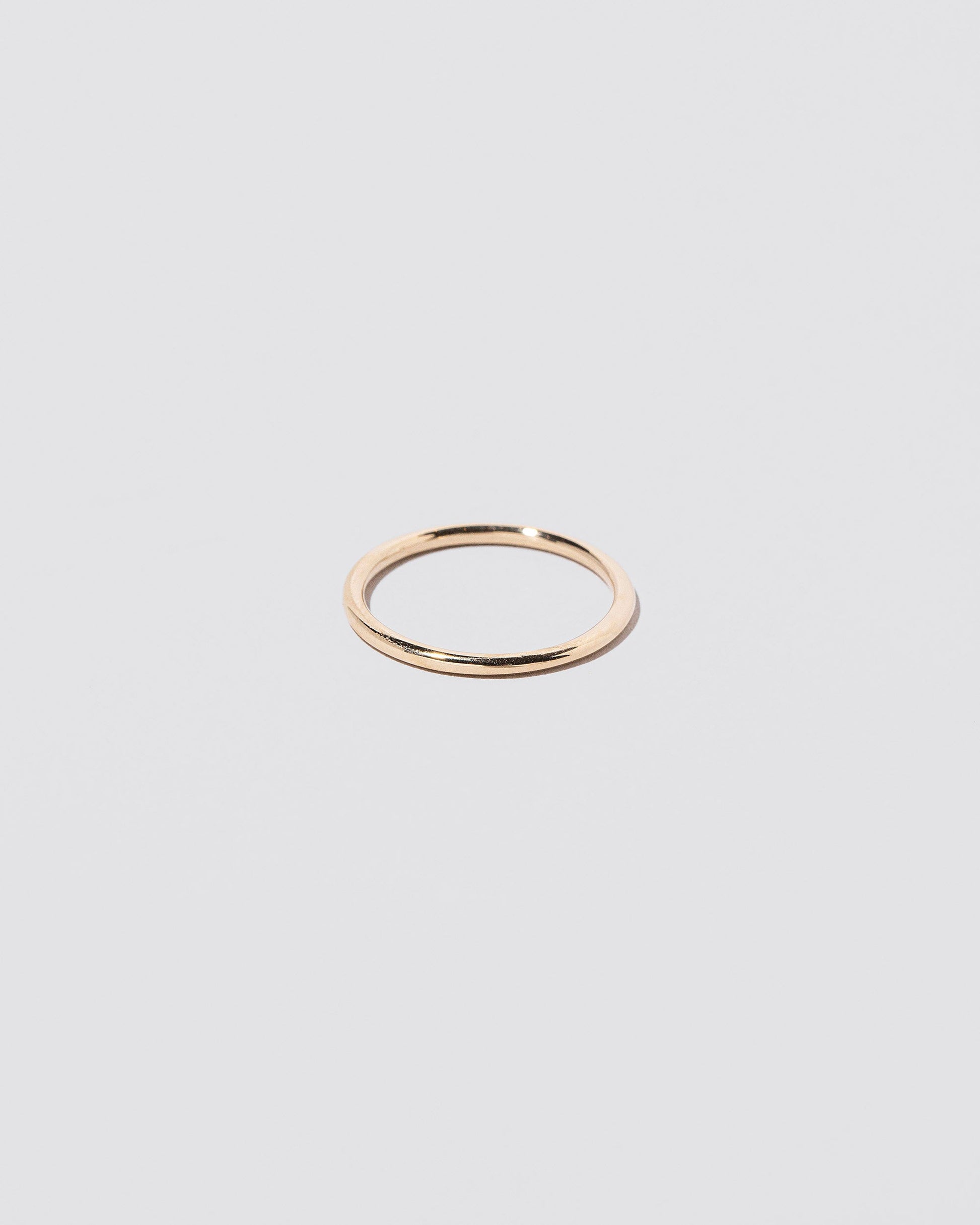 Gold Solid Dot Band on light color background.