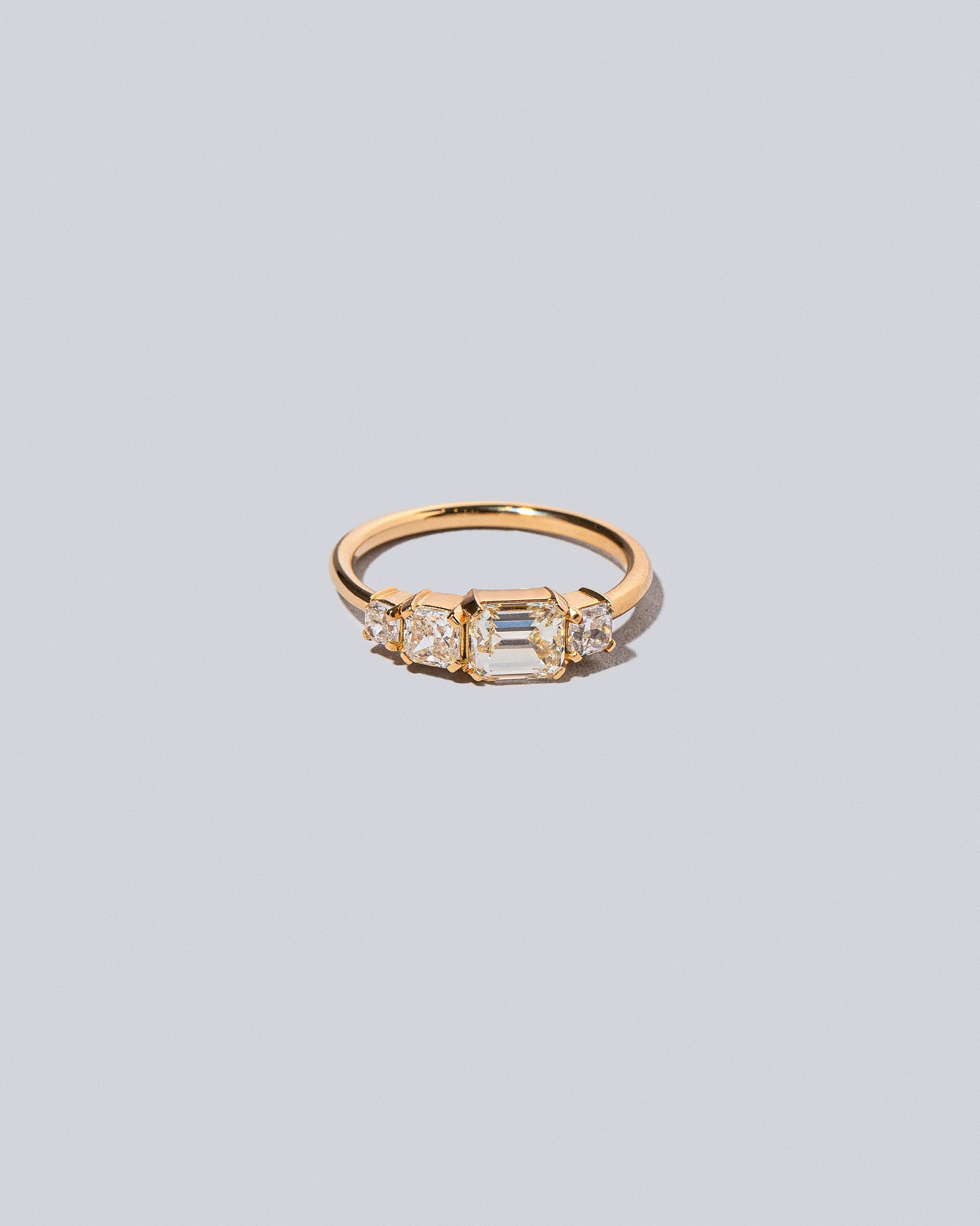 Product photo of the Lyric Ring on light light color background.