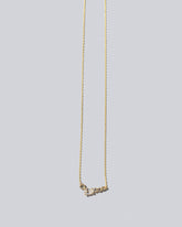  Teardrop Necklace - Diamonds on light color background.