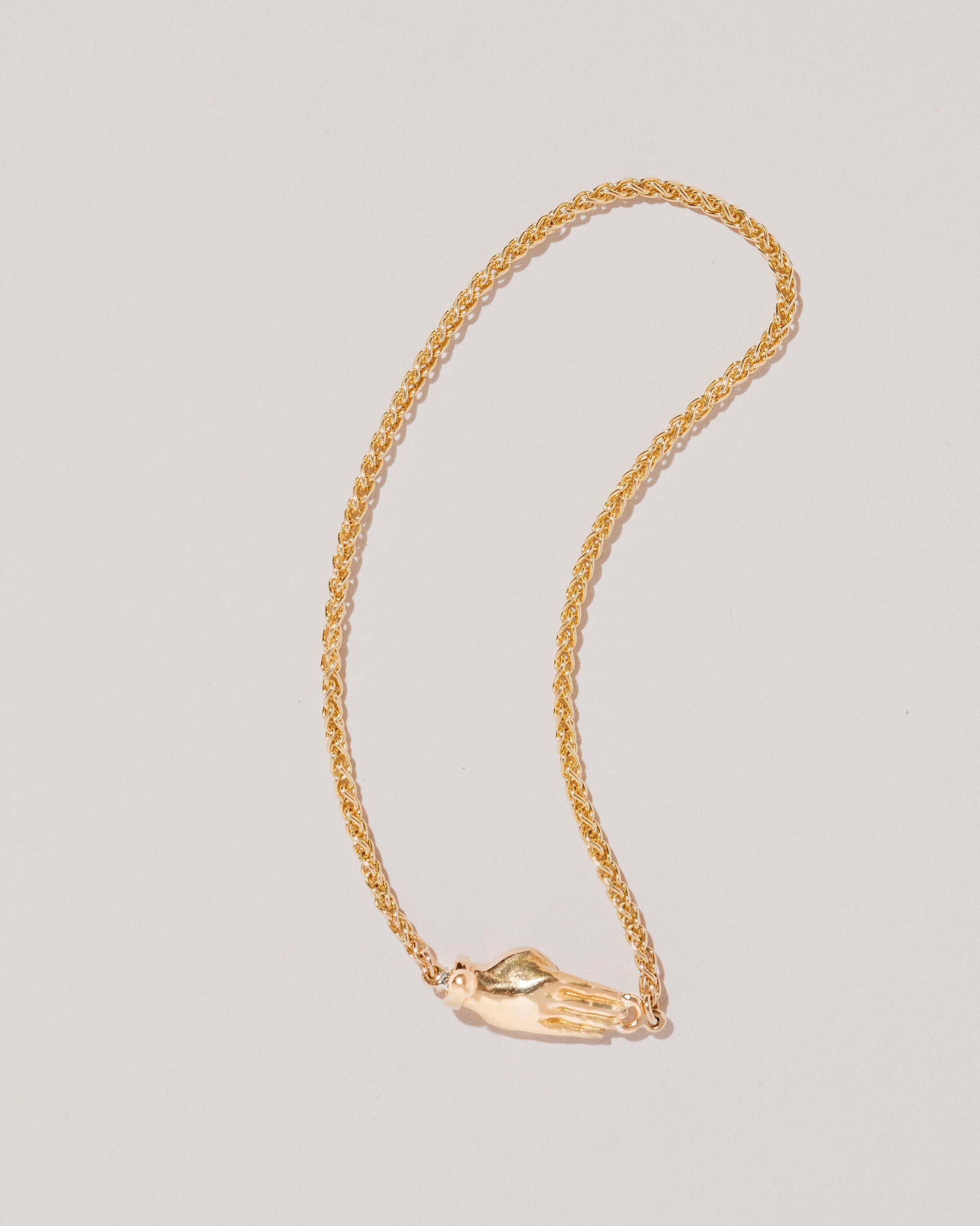  Manifestation Bracelet on light color background.