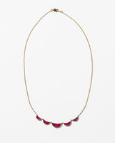 Invincibility Necklace on light colored background
