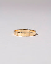Gold 3mm Etched Lines Band on light color background.