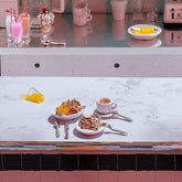 product_details::Styled image featuring the Ruby Pavé Strawberry Charm, Orange Slice Charm, Melon Slice Charm, Short Stack Pancake Charm and Bacon Charm.
