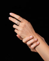 Gold White Diamond Tsunami Ring on model.