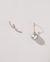  Moon Drop Earrings on light color background.