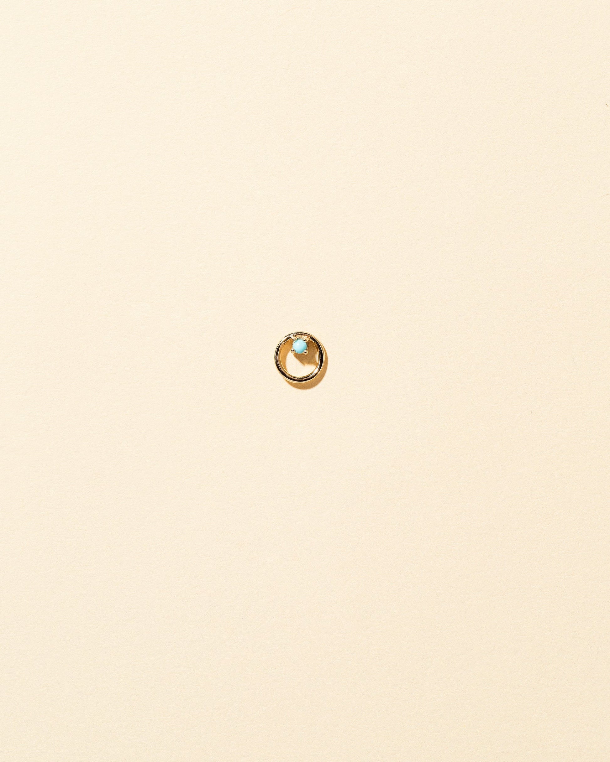  Full Moon Single Stud on light color background.
