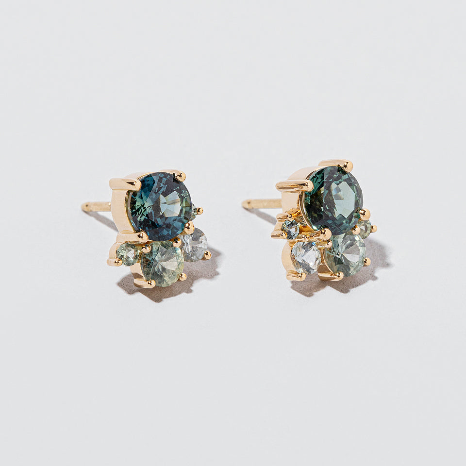 product_details:: Aerial Earrings on light color background.