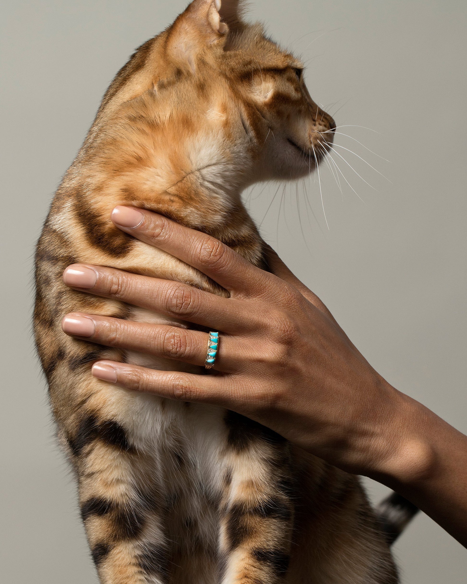 Gold Turquoise Five Triangle Ring on model.