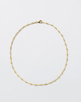  Twisted Chain Necklace on light color background.