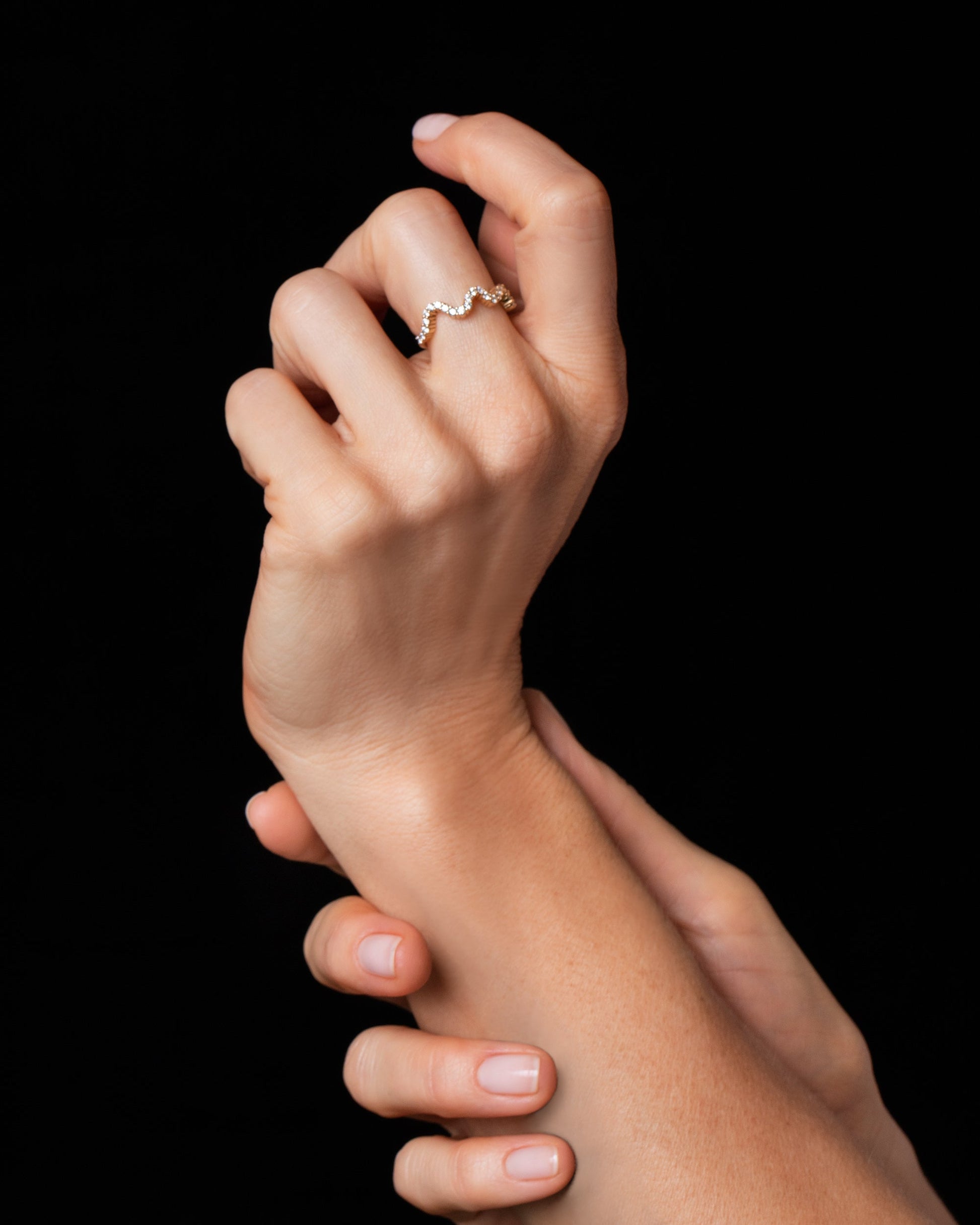 Styled image featuring the Gold White Diamond Low Tide Band on model.