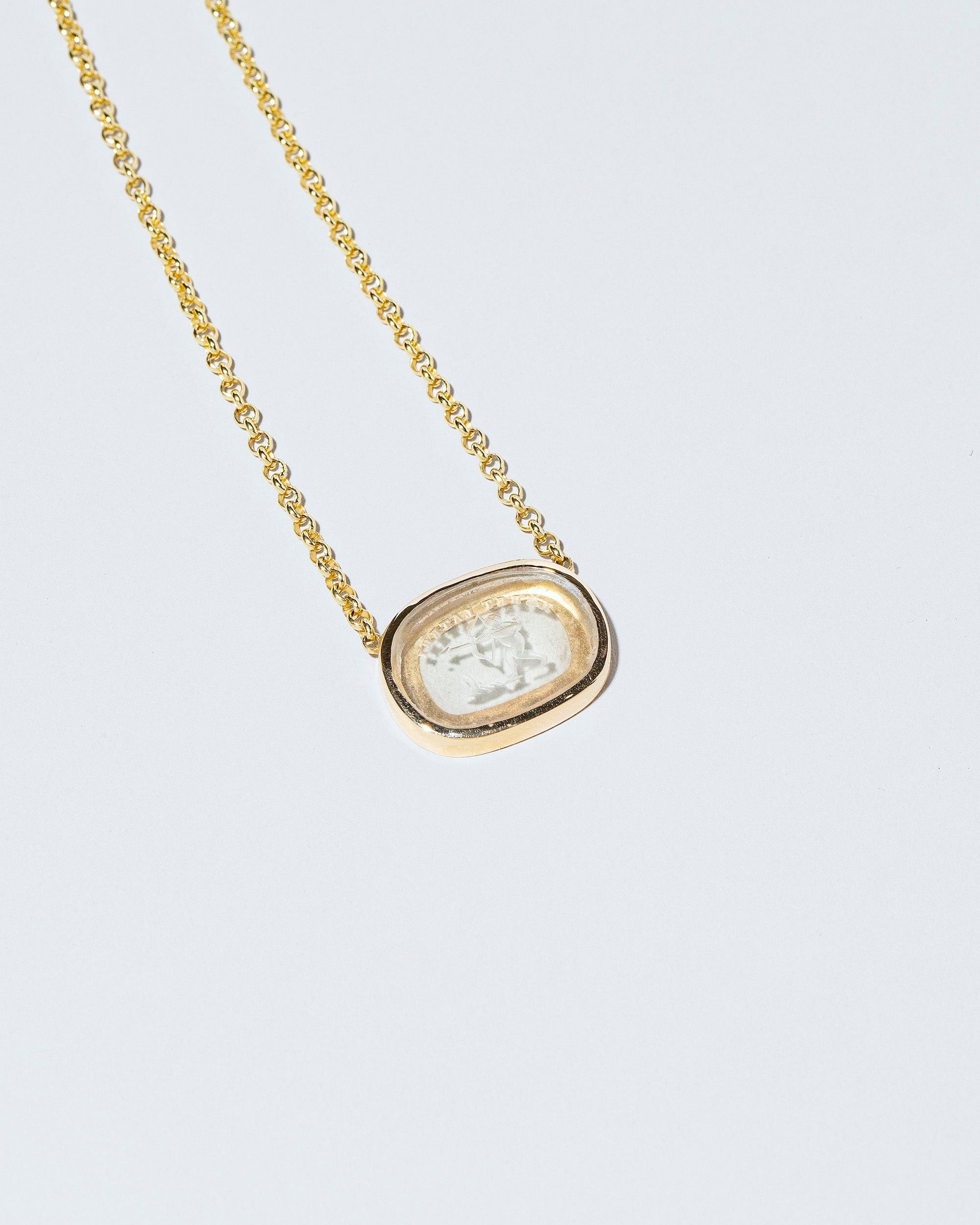  Arrow Intaglio Necklace on light color background.