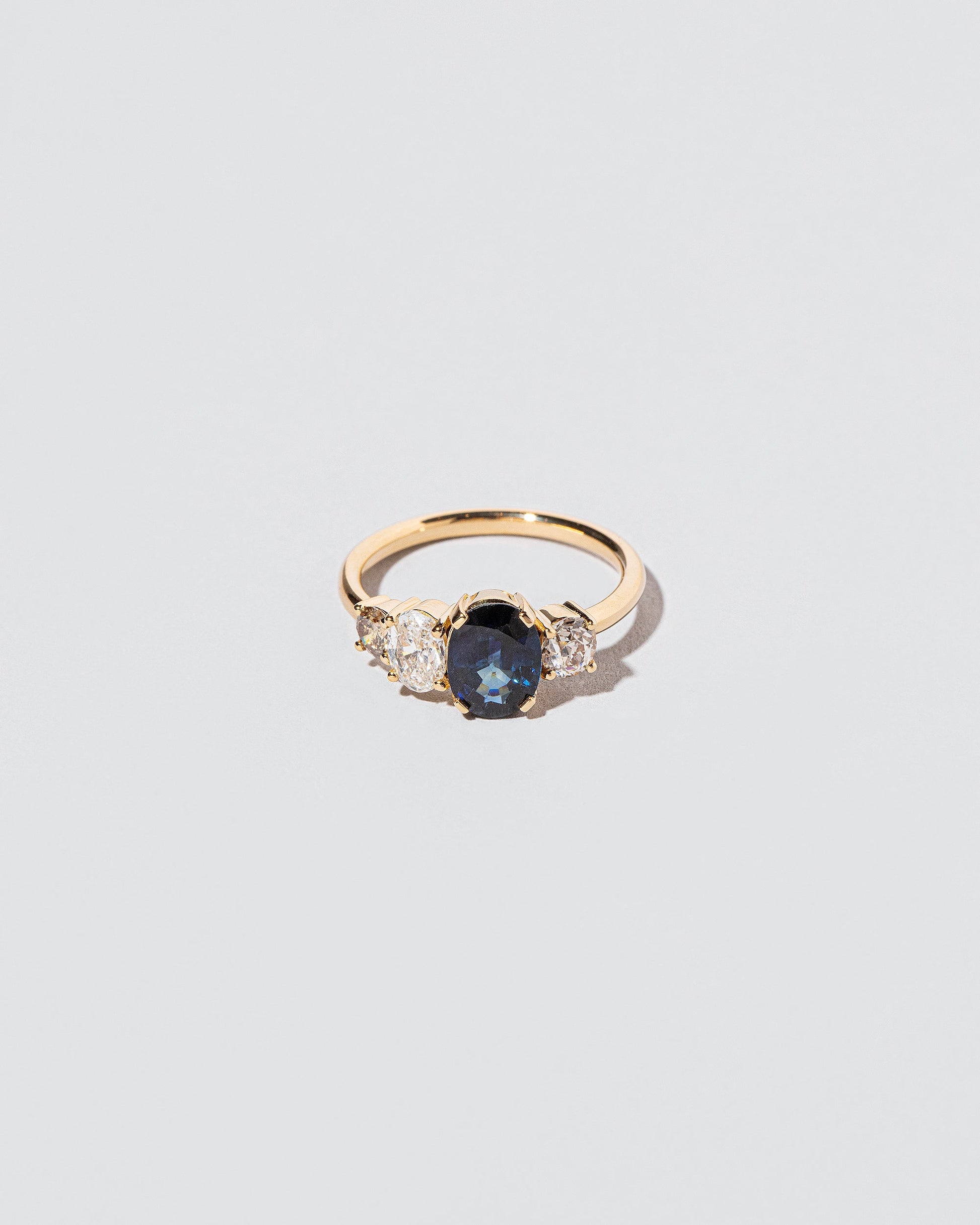  Spencer Ring on light color background.