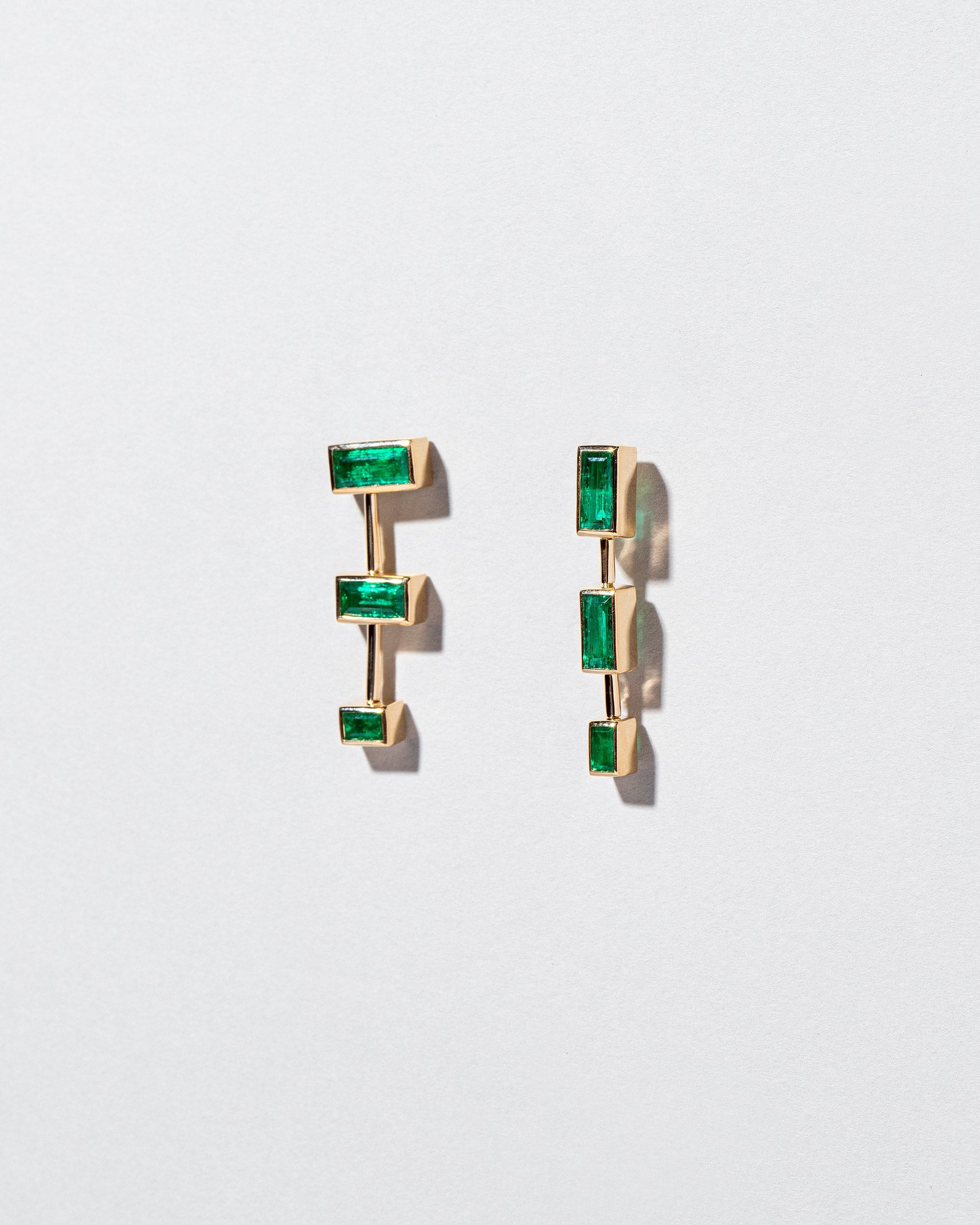  The Listening One Earrings on light color background.