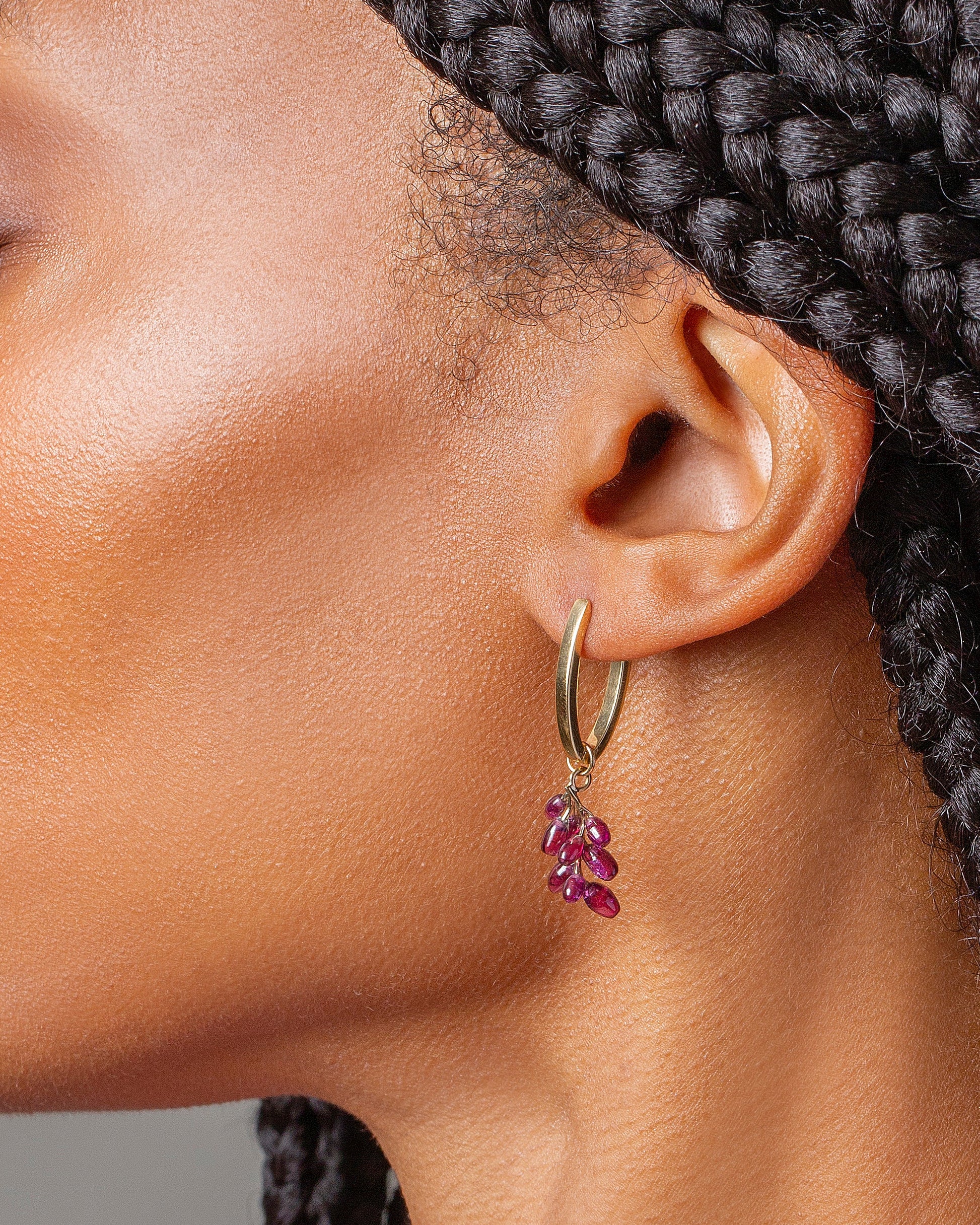 Small Table Grapes Charm and Gold Solid Tiny Loop Hoop Earrings on model.