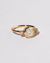  Theia Ring on light color background.