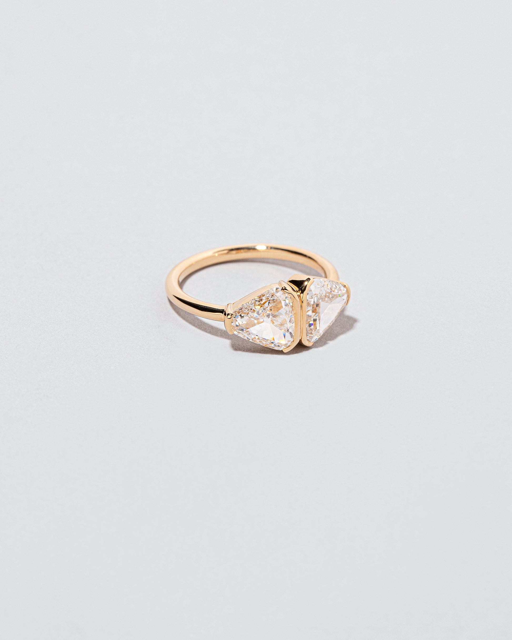View from the side of the First & Last Ring on light color background.