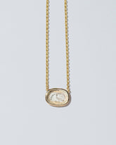  Grace Intaglio Seal Necklace on light color background.