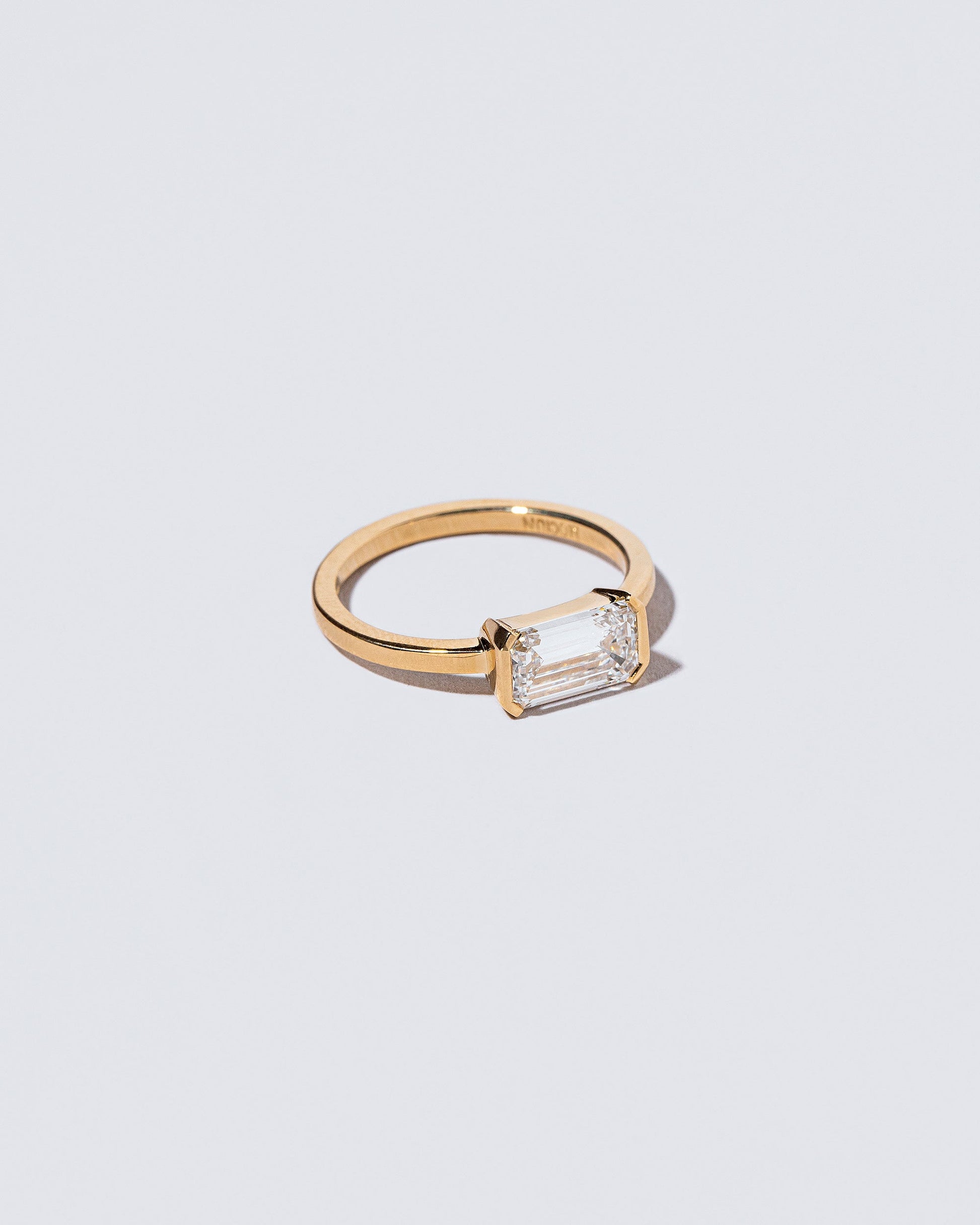 View from the side of the Constant Ring on light color background.